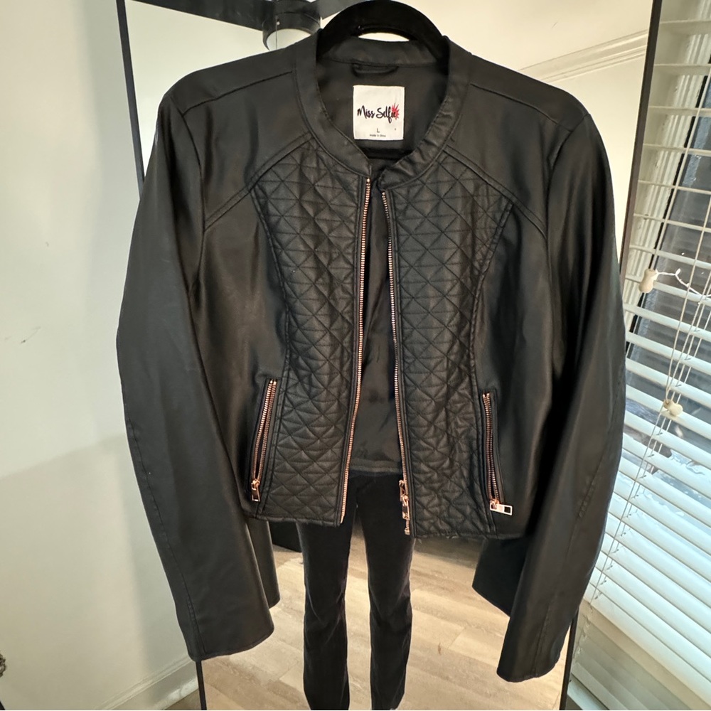 Faux leather jacket 
Size M/L